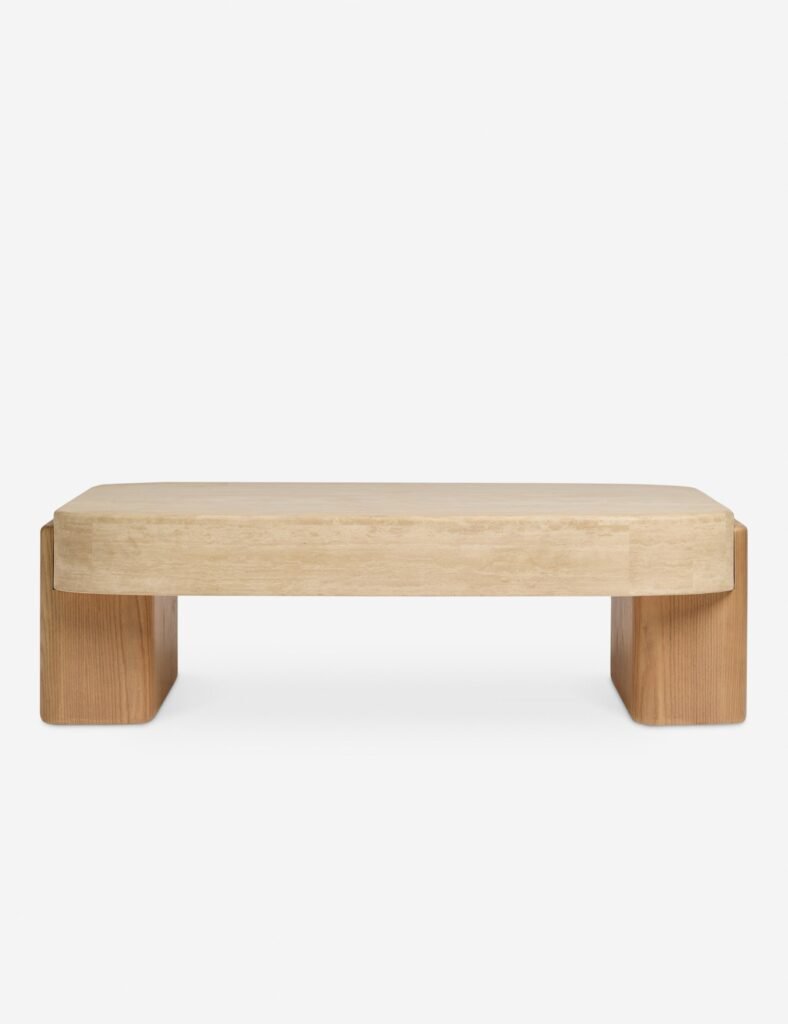 Lulu and Georgia coffee table in sculptural modern design with warm polished living room style.