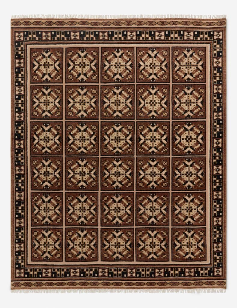  rug featuring soft neutral textures and a timeless design that grounds the Polished Warmth living room with warmth and elegance